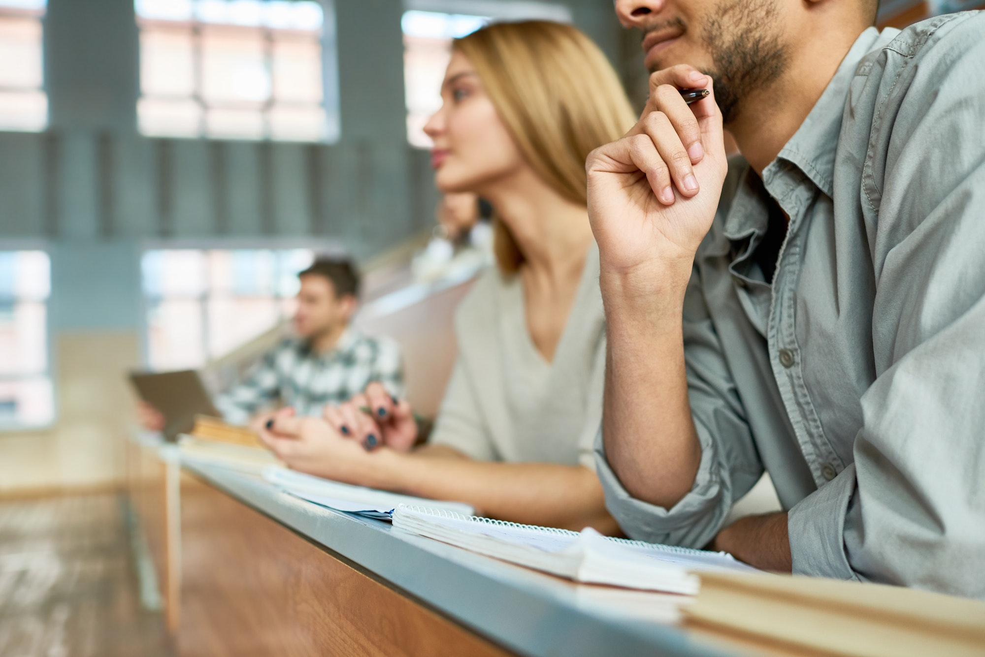 Students Listening to Lecture at University